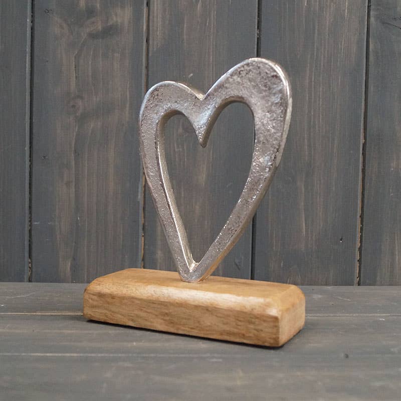 Cut Out Aluminium Heart On Wooden Base