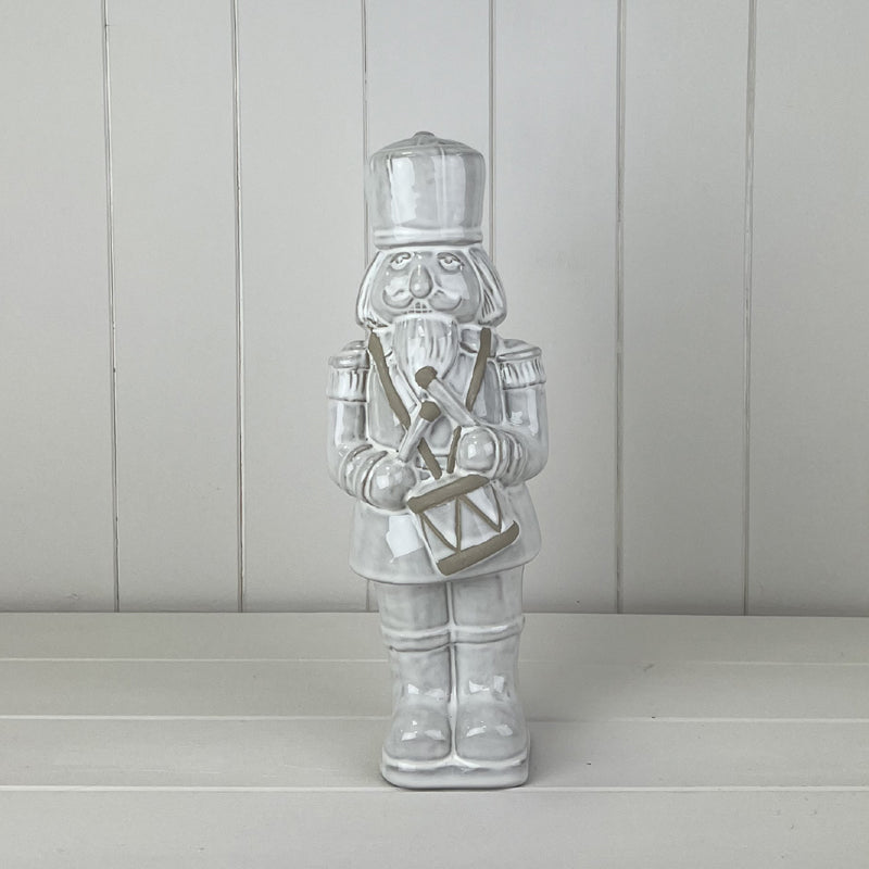 Glazed Ceramic Nutcracker Ornament With Textured Detail