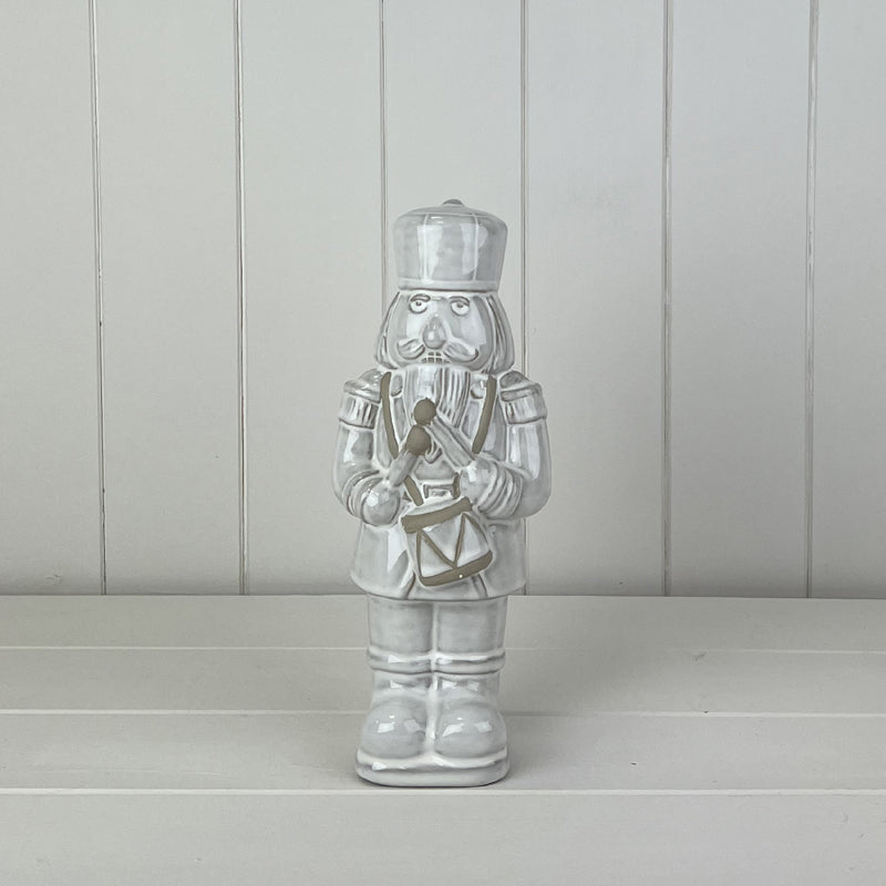 Glazed Ceramic Nutcracker Ornament With Textured Detail