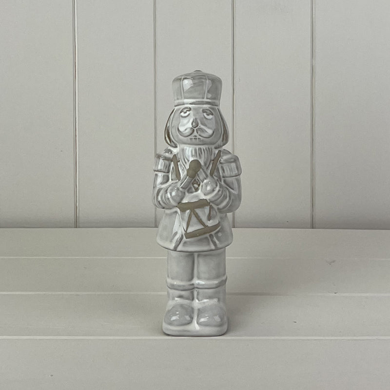 Glazed Ceramic Nutcracker Ornament With Textured Detail