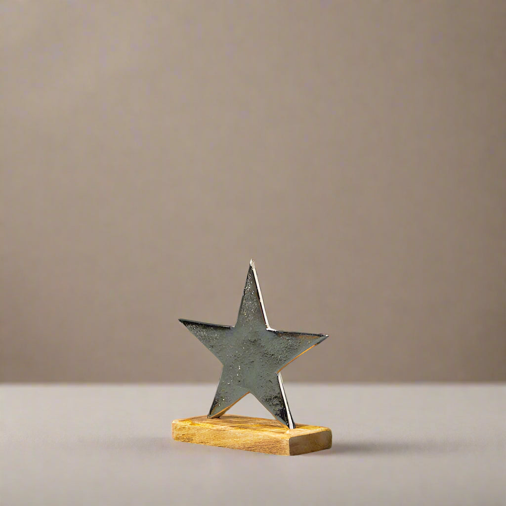 Silver Star On Wooden Base