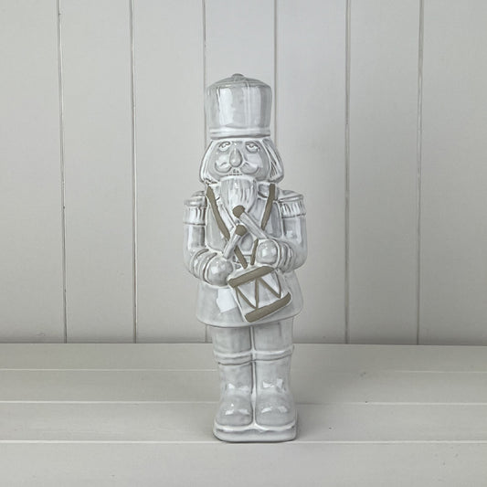 Glazed Ceramic Nutcracker Ornament With Textured Detail