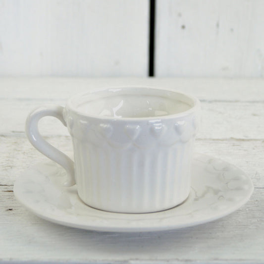 White Ribbed Ceramic Cup and Saucer with Heart Pattern