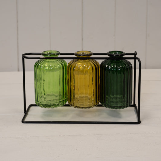 Three Glass Bottles With Stand