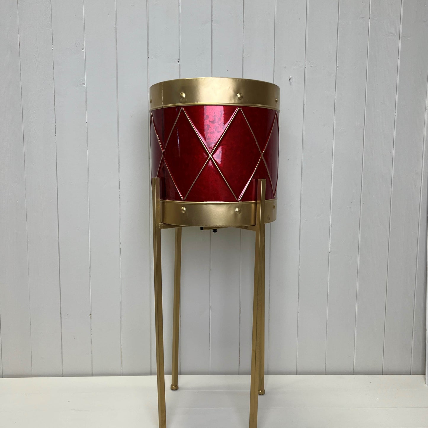 Red and Gold Metal Planter on Stand