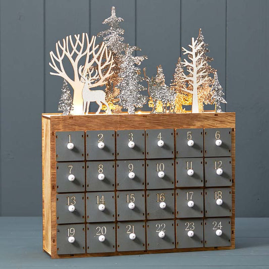 Wooden advent calendar with drawers and LEDs