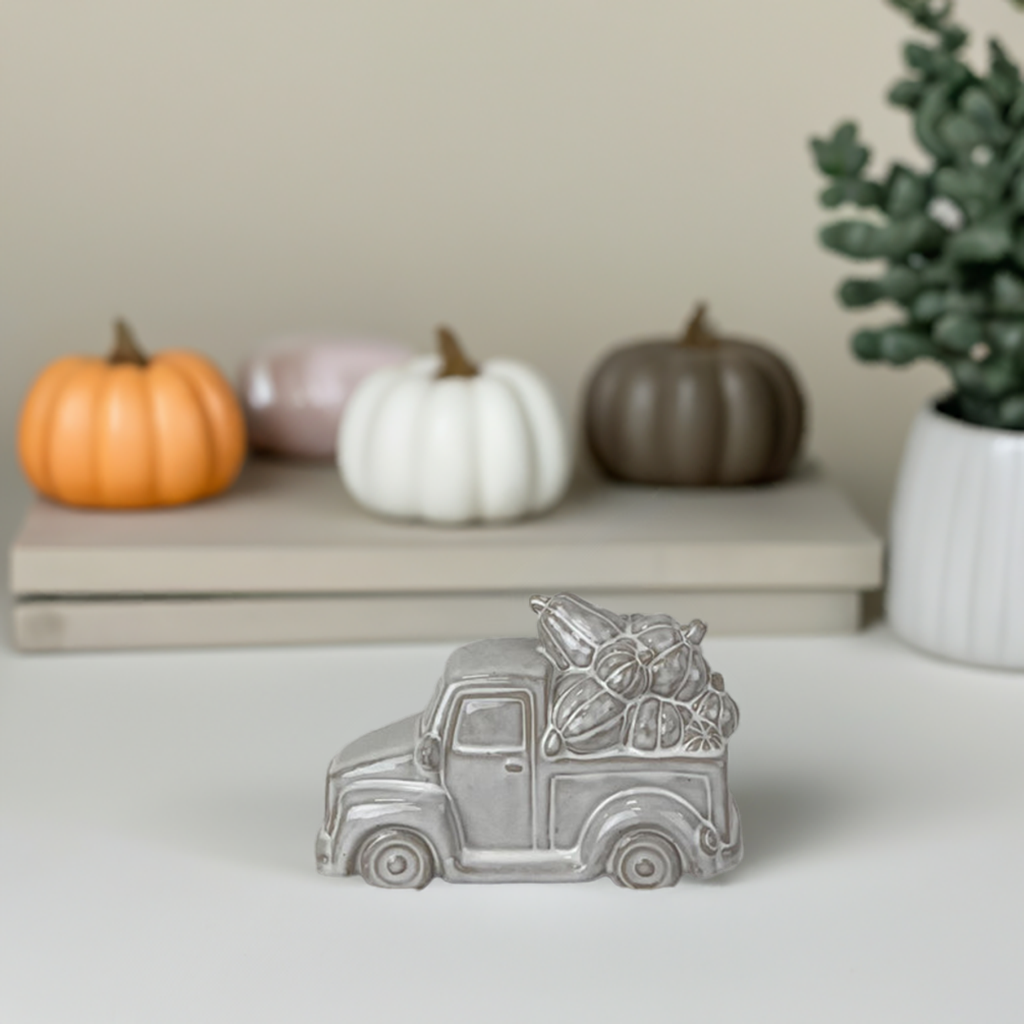 Glazed Ceramic Car Carrying Pumpkins Ornament with Textured Detail