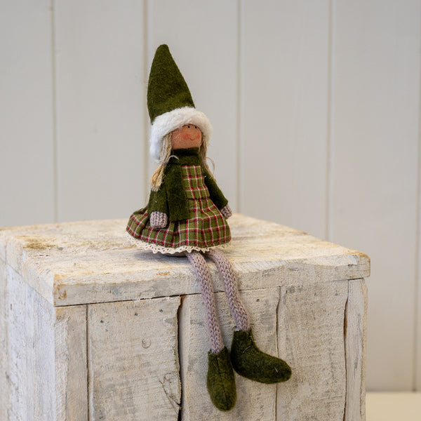 Fabric Sitting Girl in Green Outfit